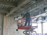 Installing ductwork fitters at the 2nd floor Facing East.jpg
